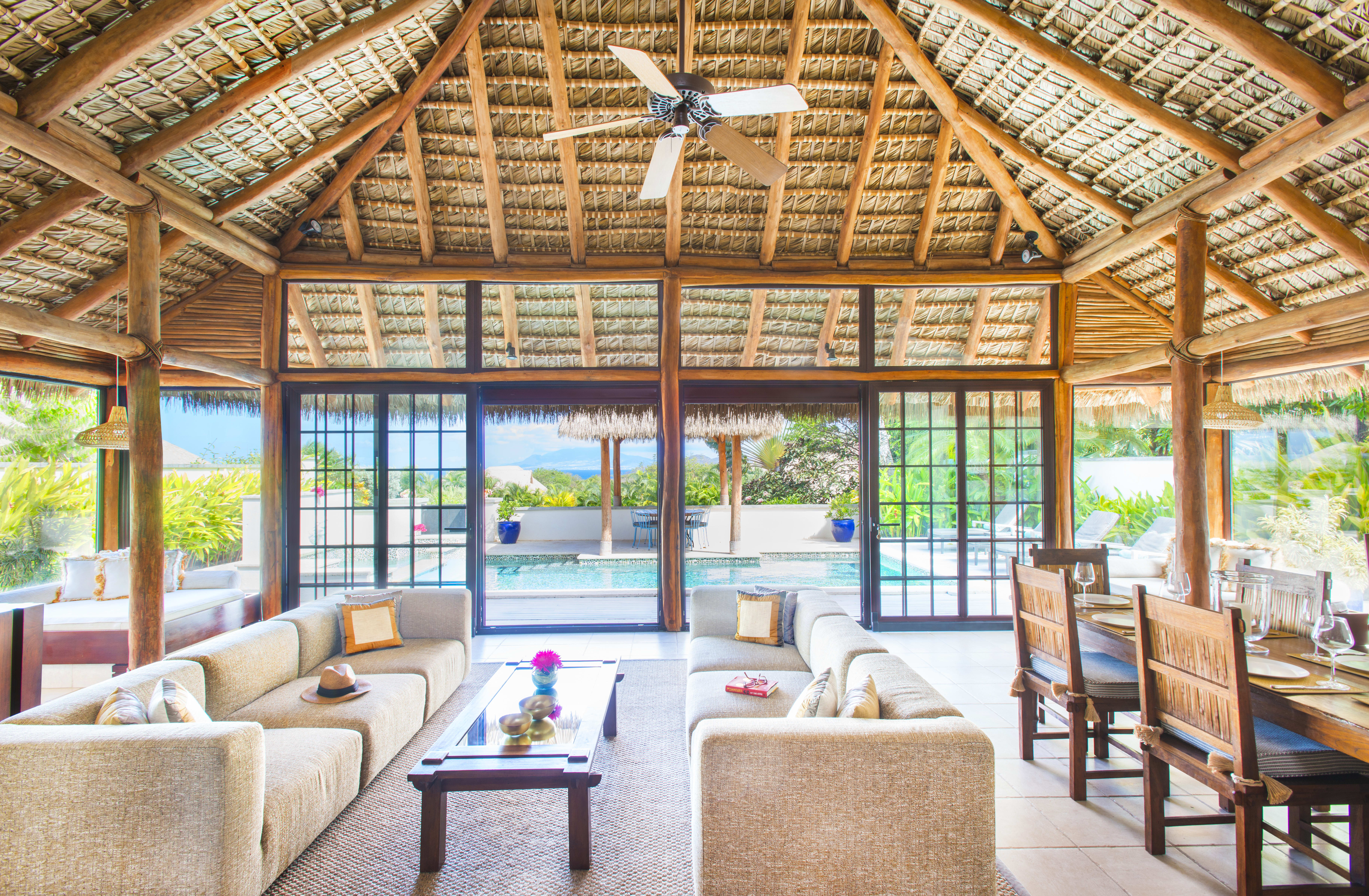 A living indoor/outdoor living room in a private home in Nevis, West Indies.