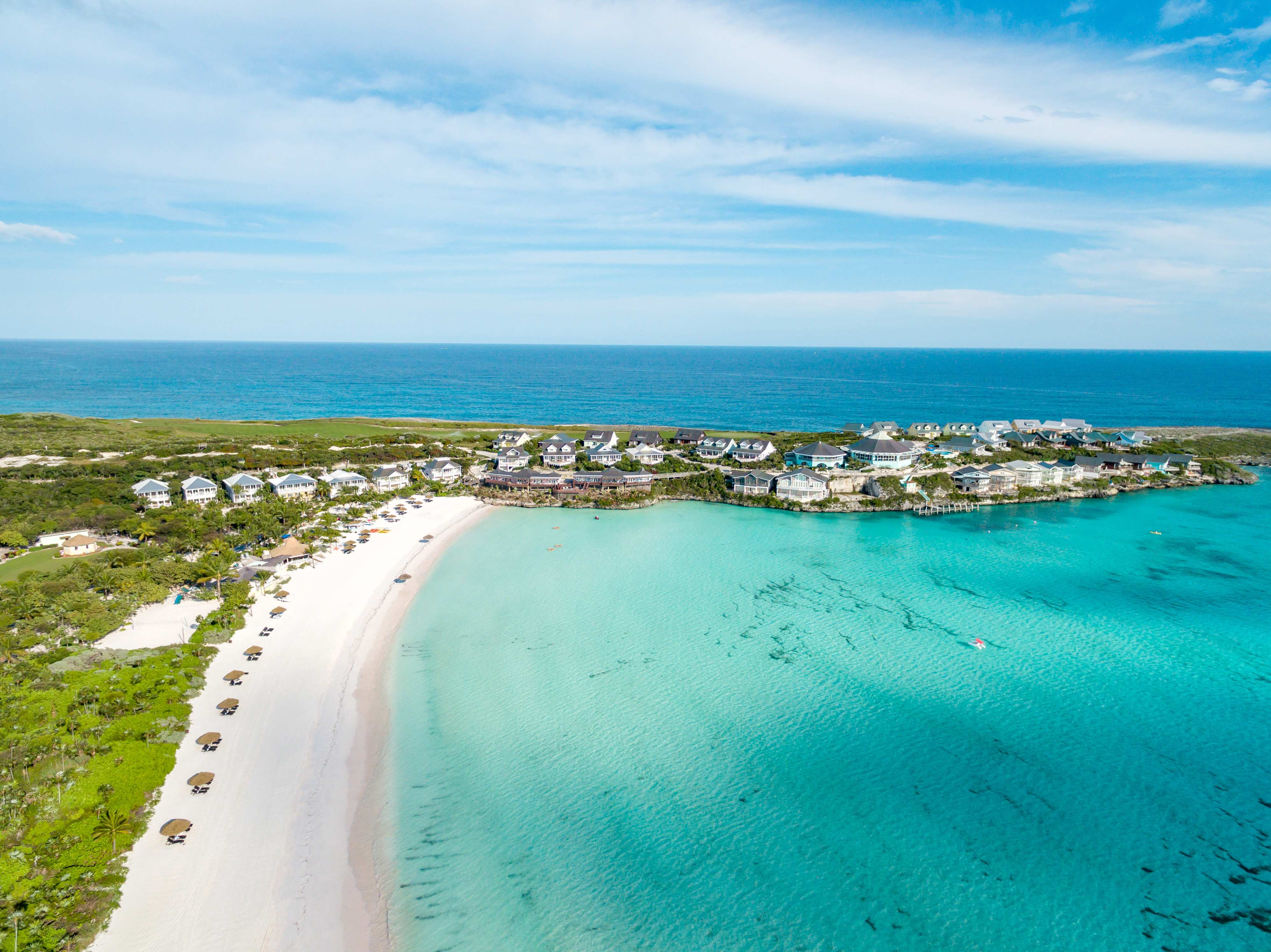Aerial view of The Abaco Club resort with turquoise waters and white sandy beaches.