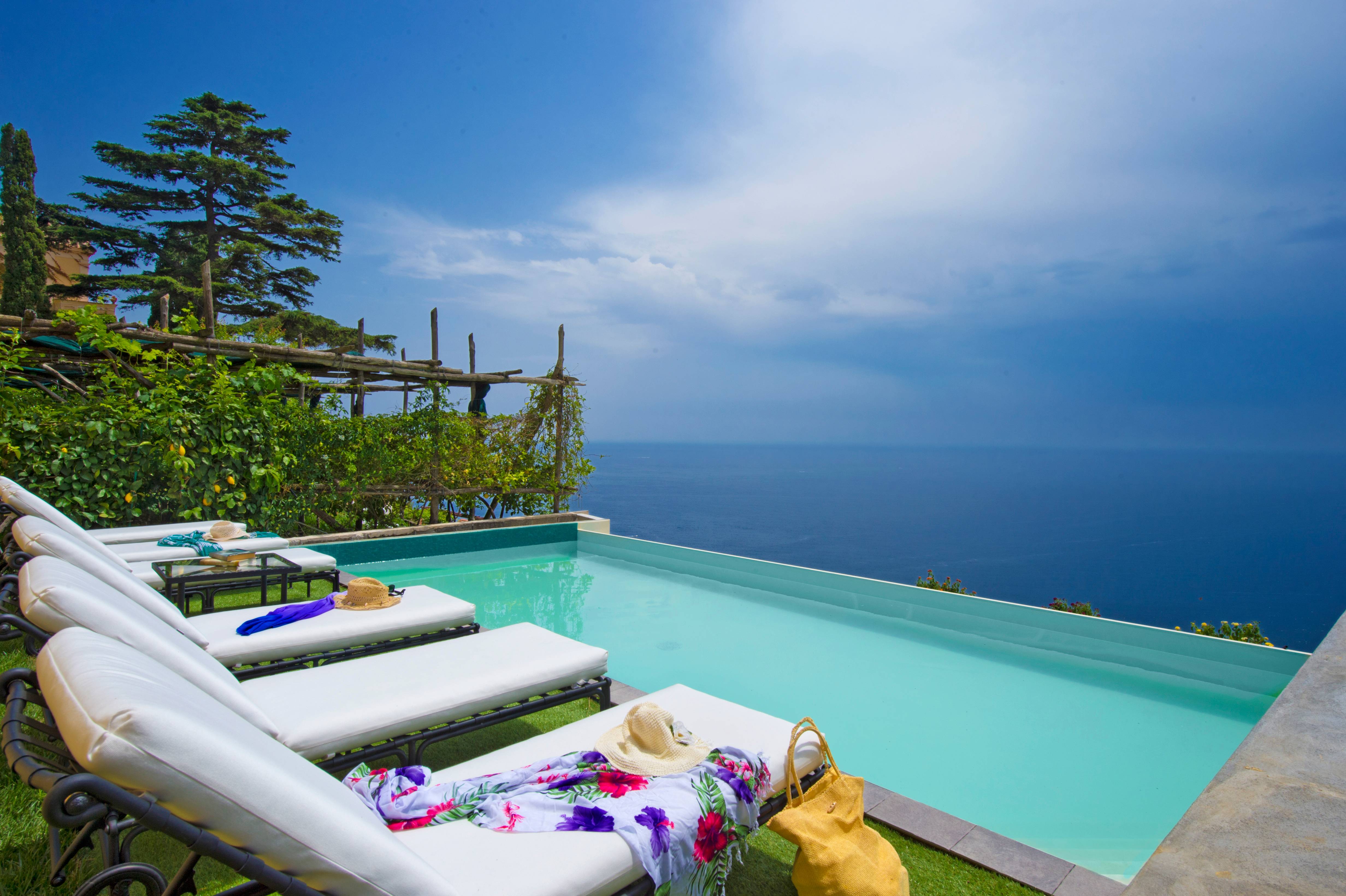 Exclusive Resorts' private villa in Amalfi with infinity pool overlooking the Mediterranean Sea.