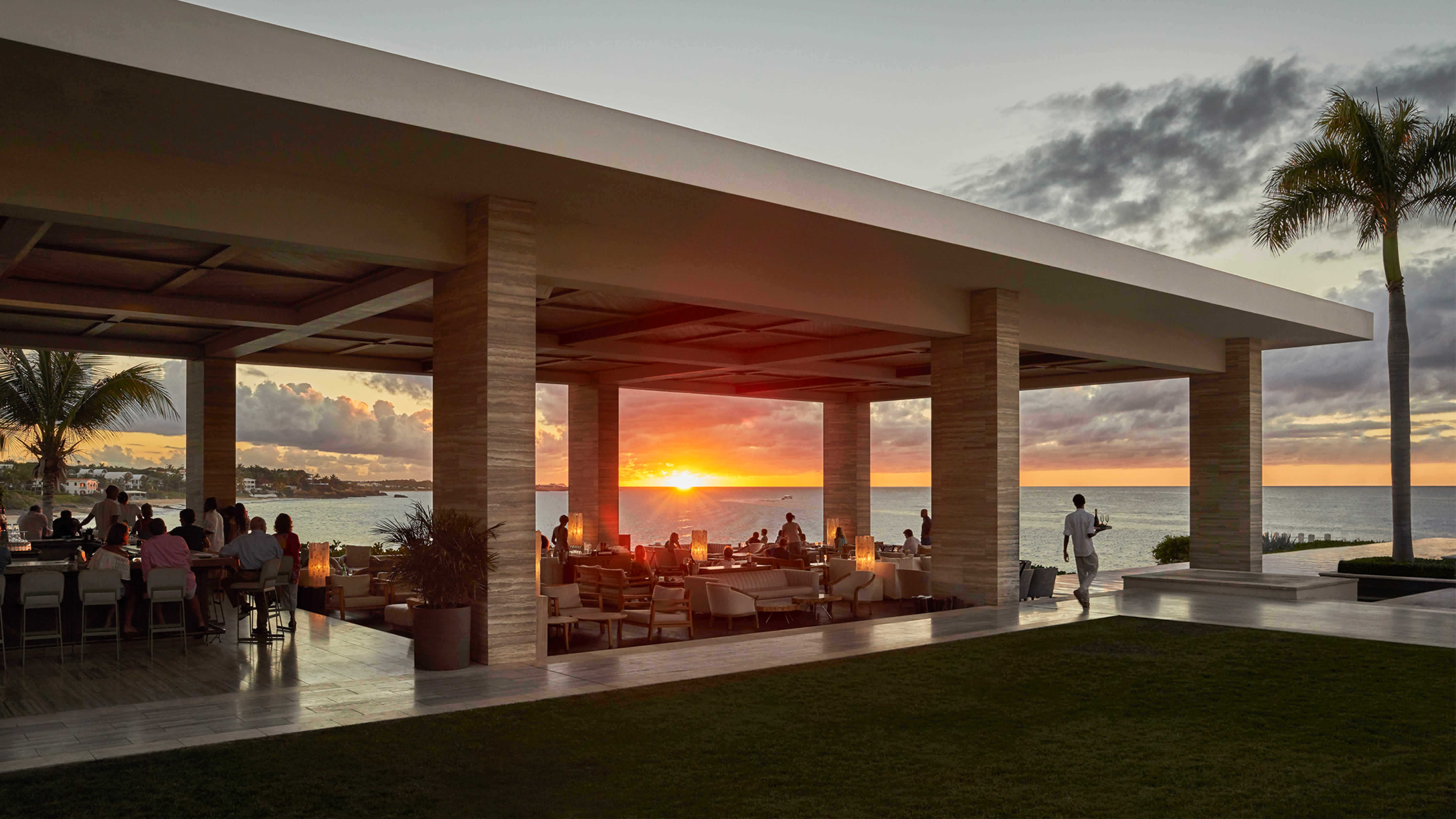 Outdoor bar and restaurant with view of the bay in Anguilla.
