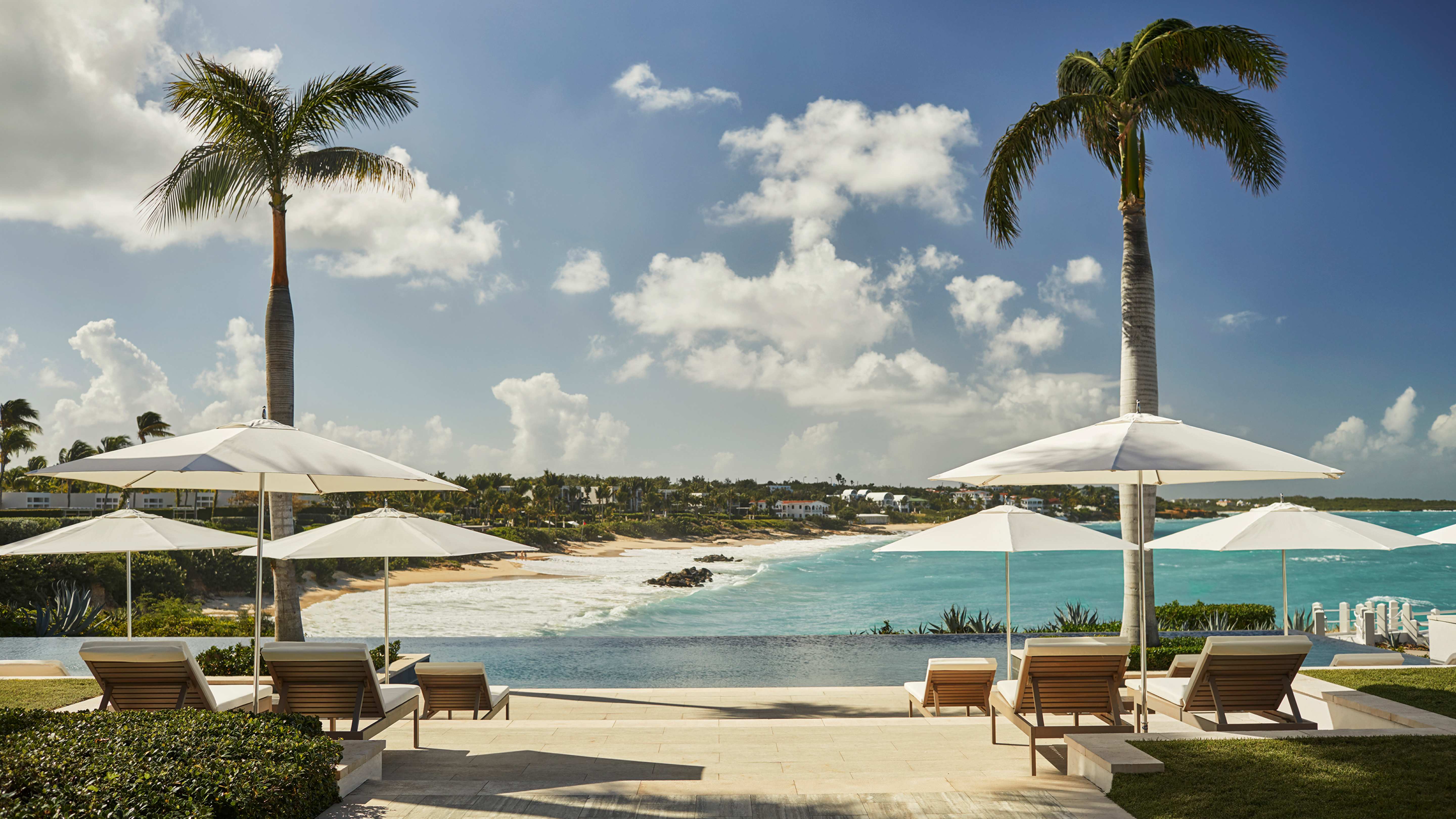 A resort pool facing the beach in Anguilla.