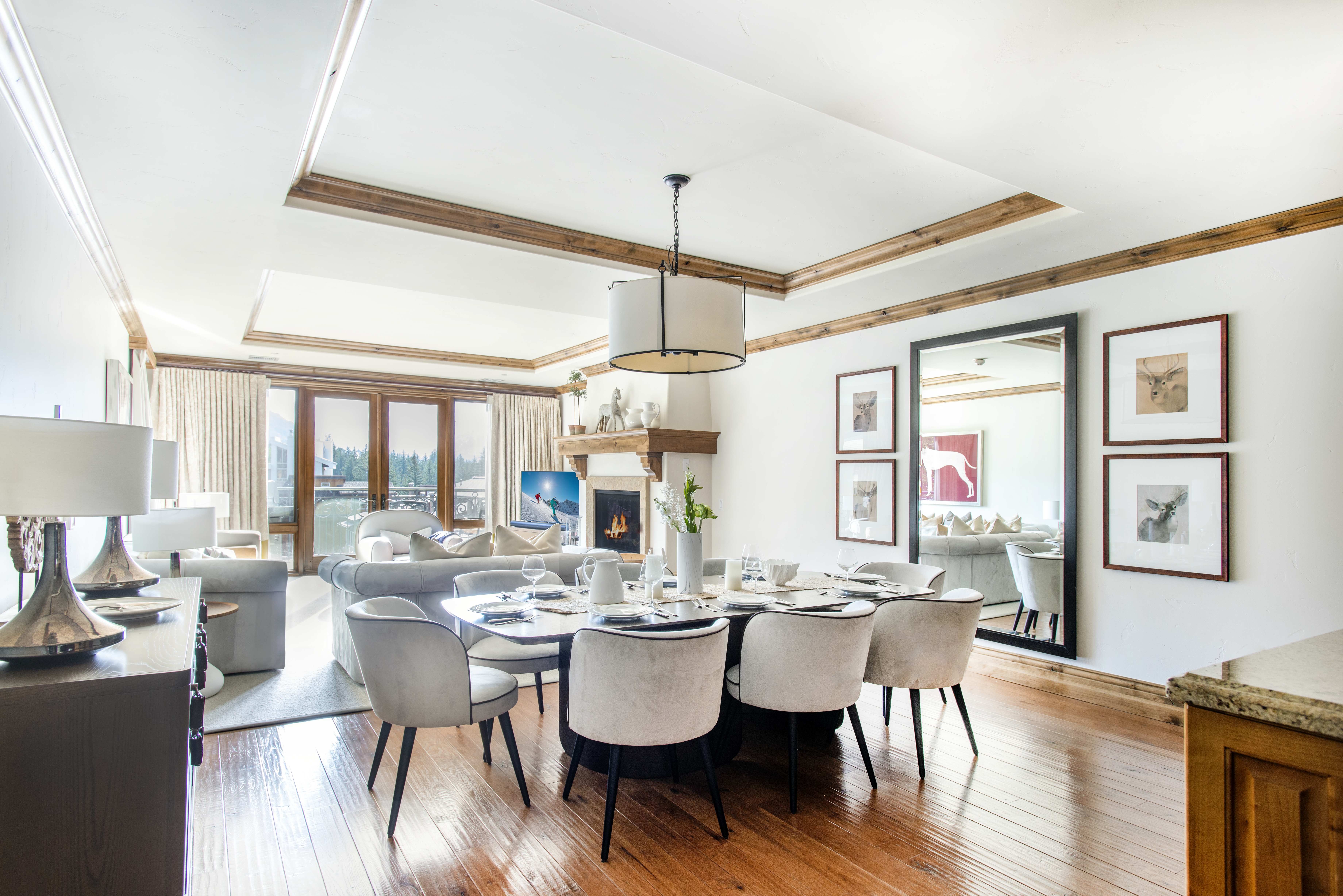 Exclusive Resorts property dining area at The Arrabelle at Vail Square with elegant table setting and fireplace.