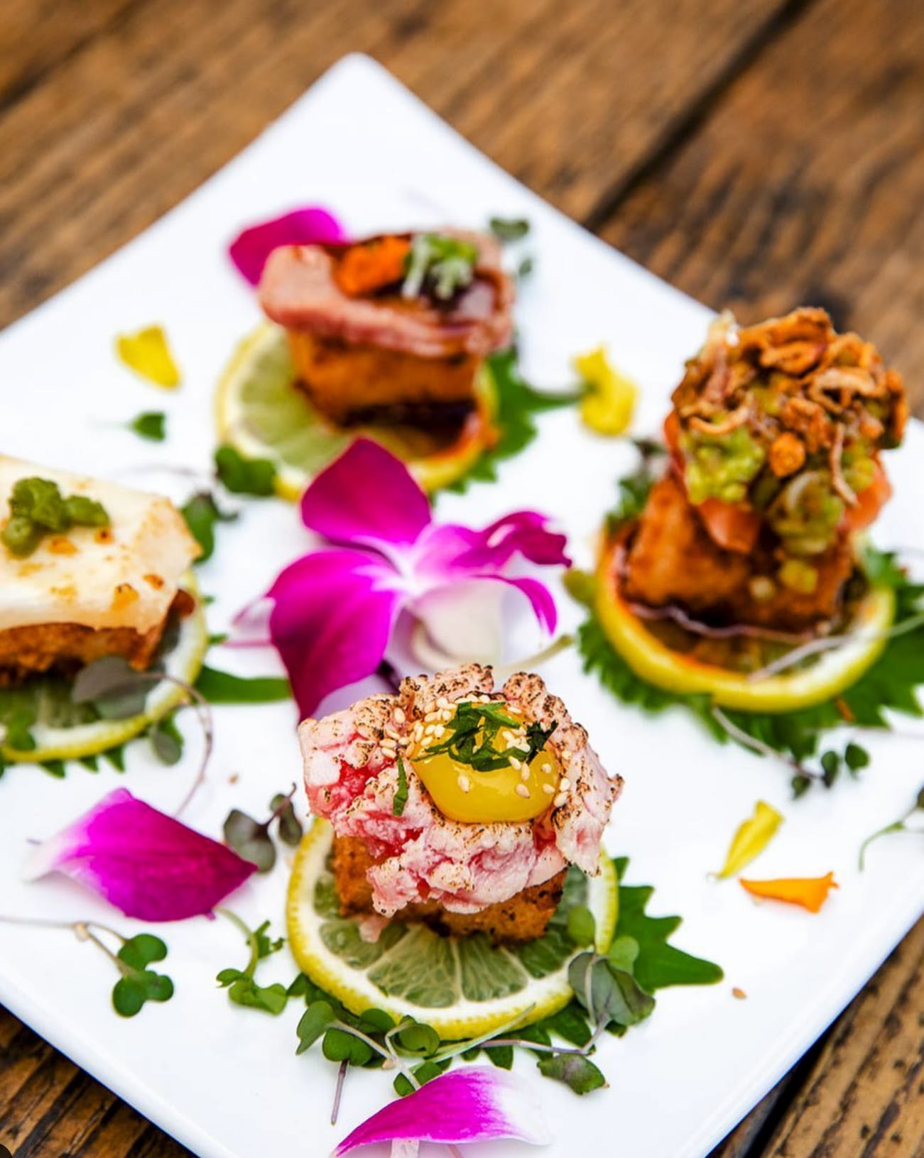 A garnished appetizer on a plate.