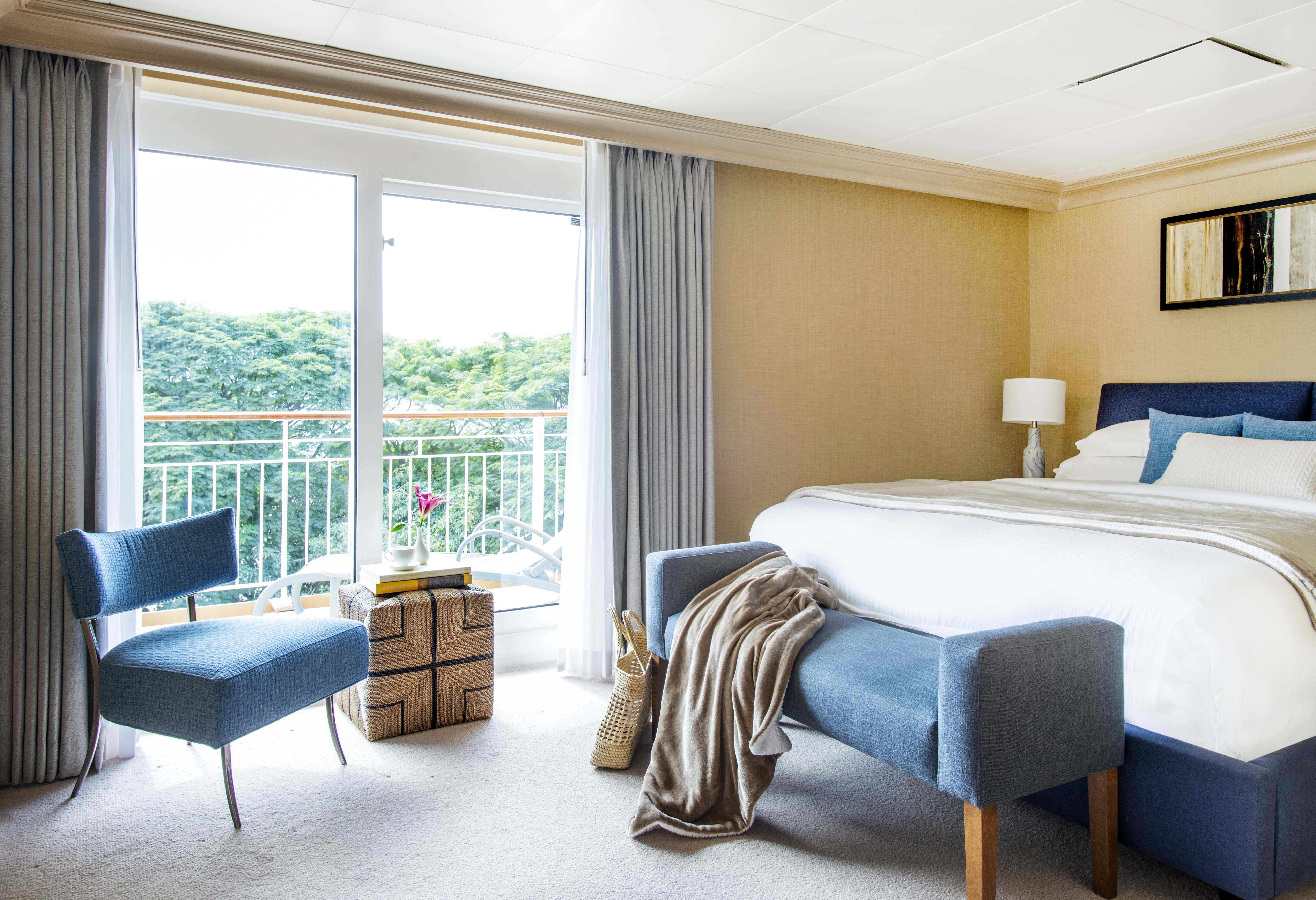 Bedroom in unit on luxury ship.
