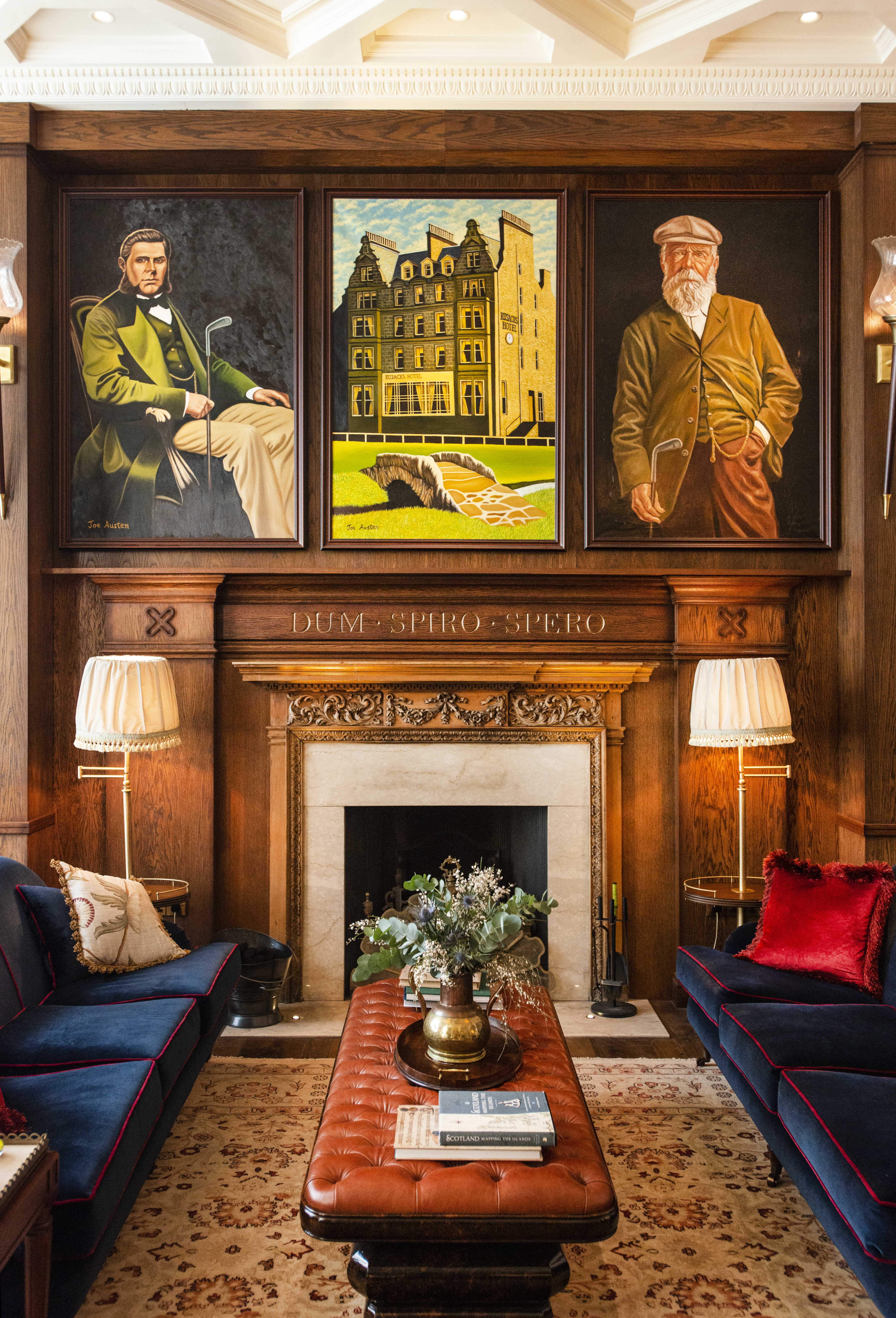 Indoor seating area with pictures above a fireplace in Scotland.