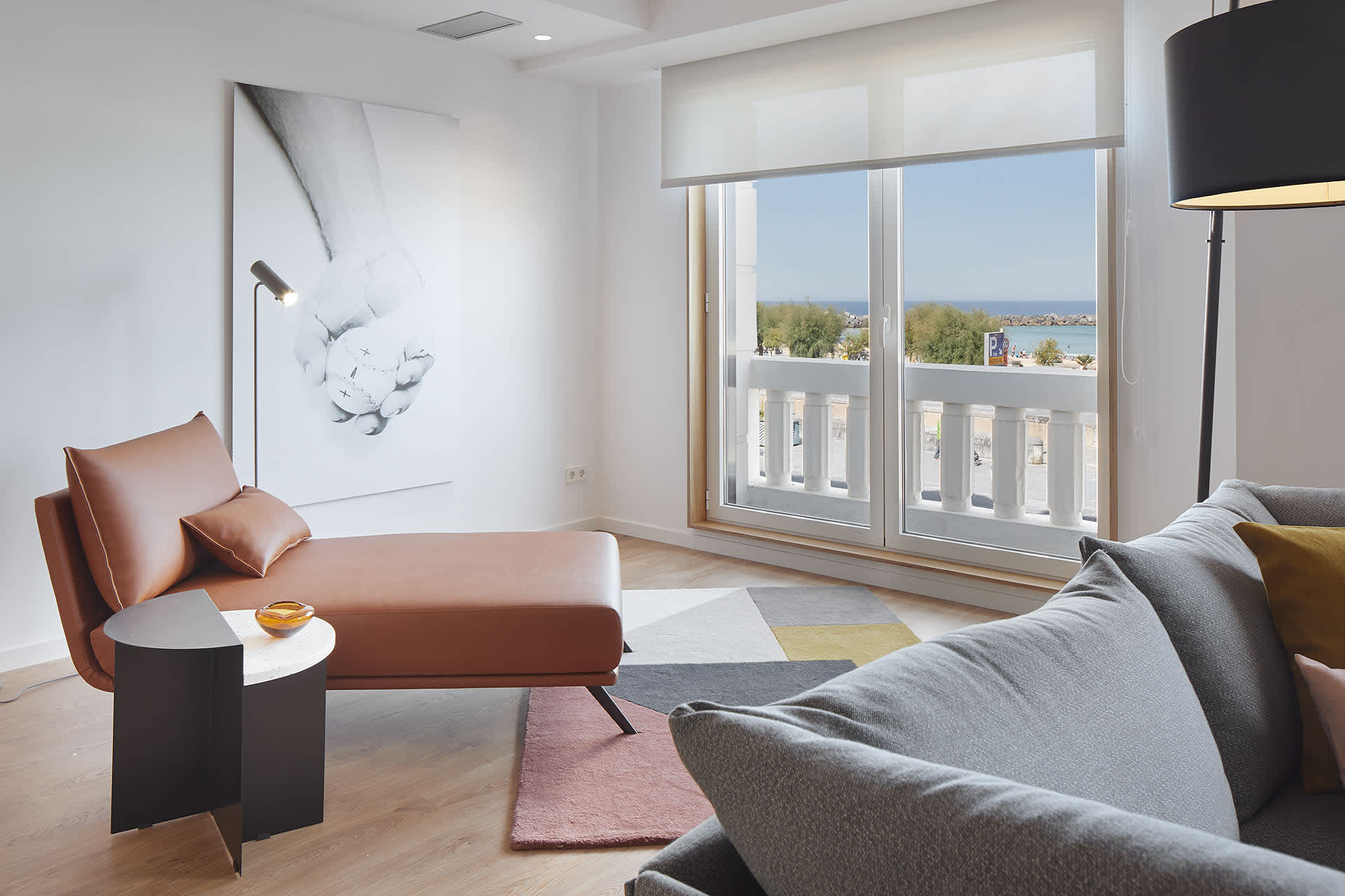 Exclusive Resorts' private villa in San Sebastián, Spain, featuring a modern lounge area with ocean views.