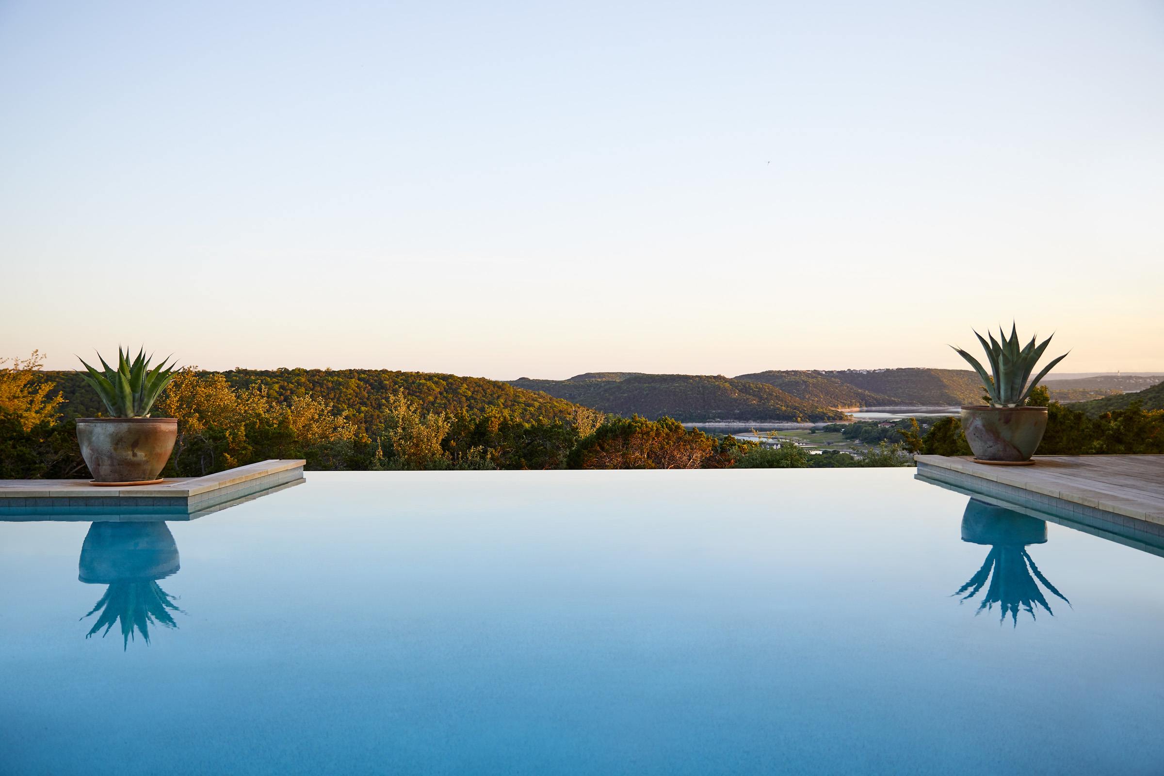 Infinity pool at Miraval Resort and Spa in Austin overlooking Lake Travis and Texas Hill County.