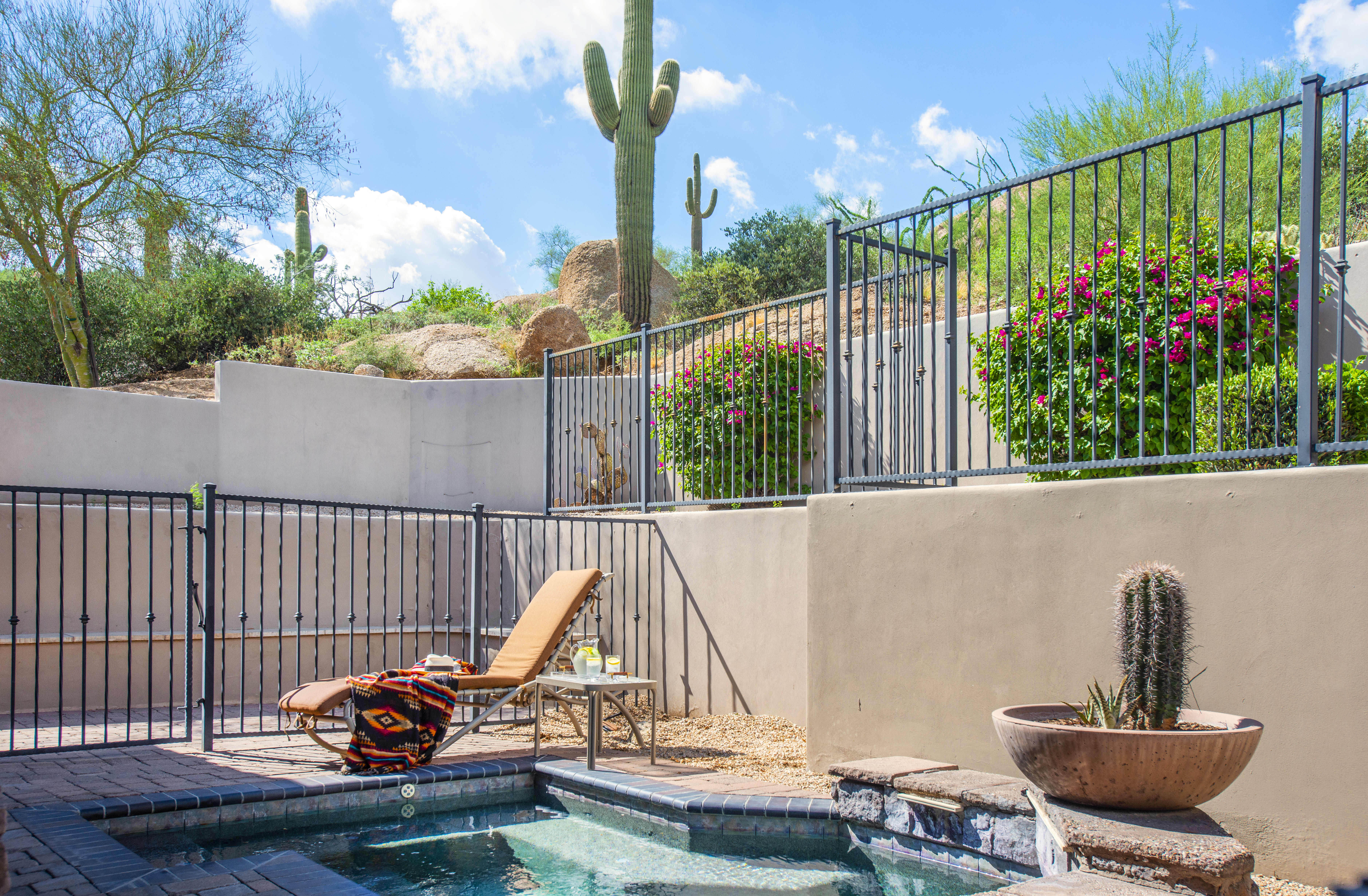 Private pool area with desert views at an Exclusive Resorts' home in Scottsdale at The Rocks Club.