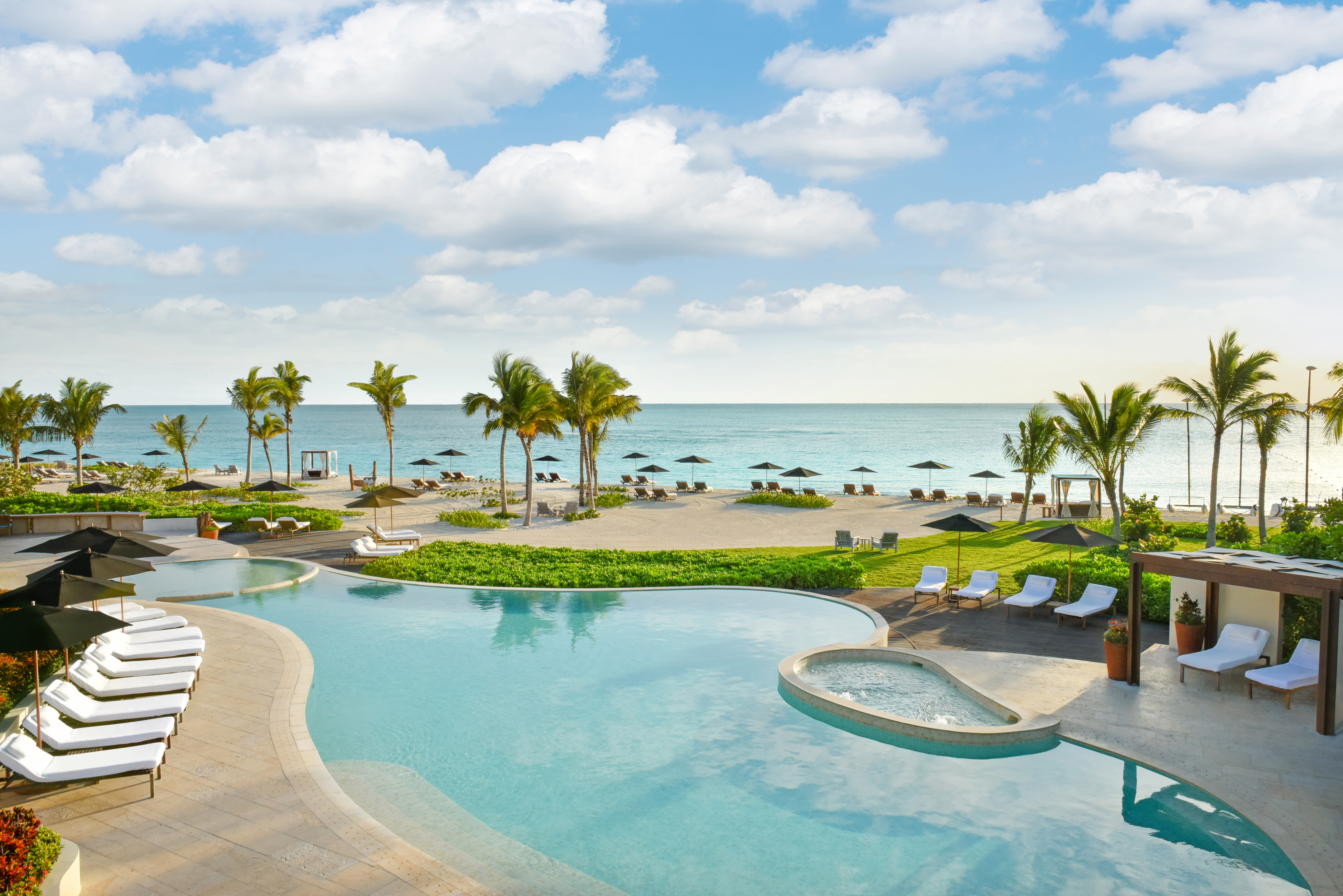 Infinity pool overlooking the ocean at Rosewood Mayakoba, near Exclusive Resorts in Riviera Maya, Mexico.