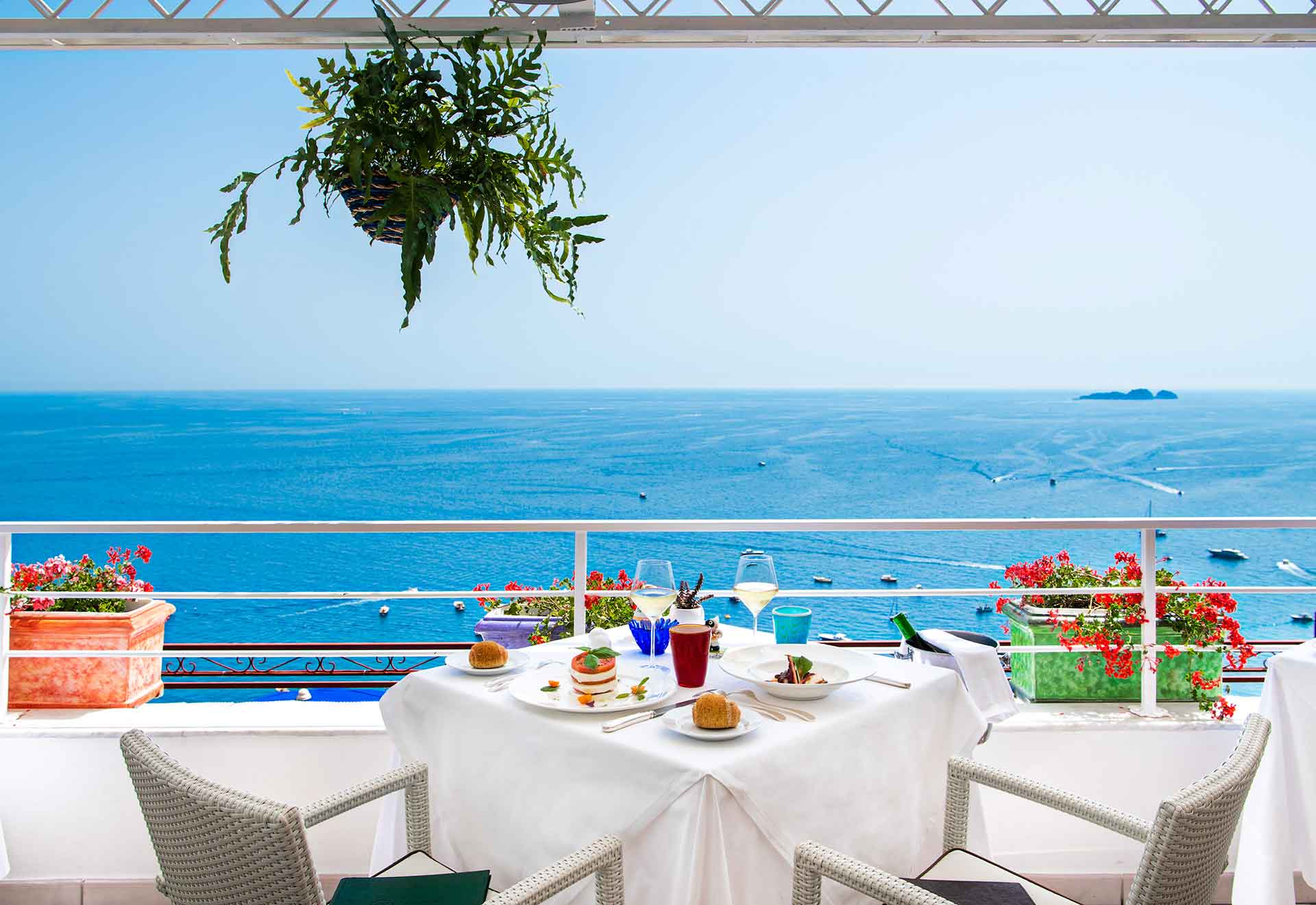 Dining table with a view of the Amalfi Coast and the Tyrrhenian Sea.