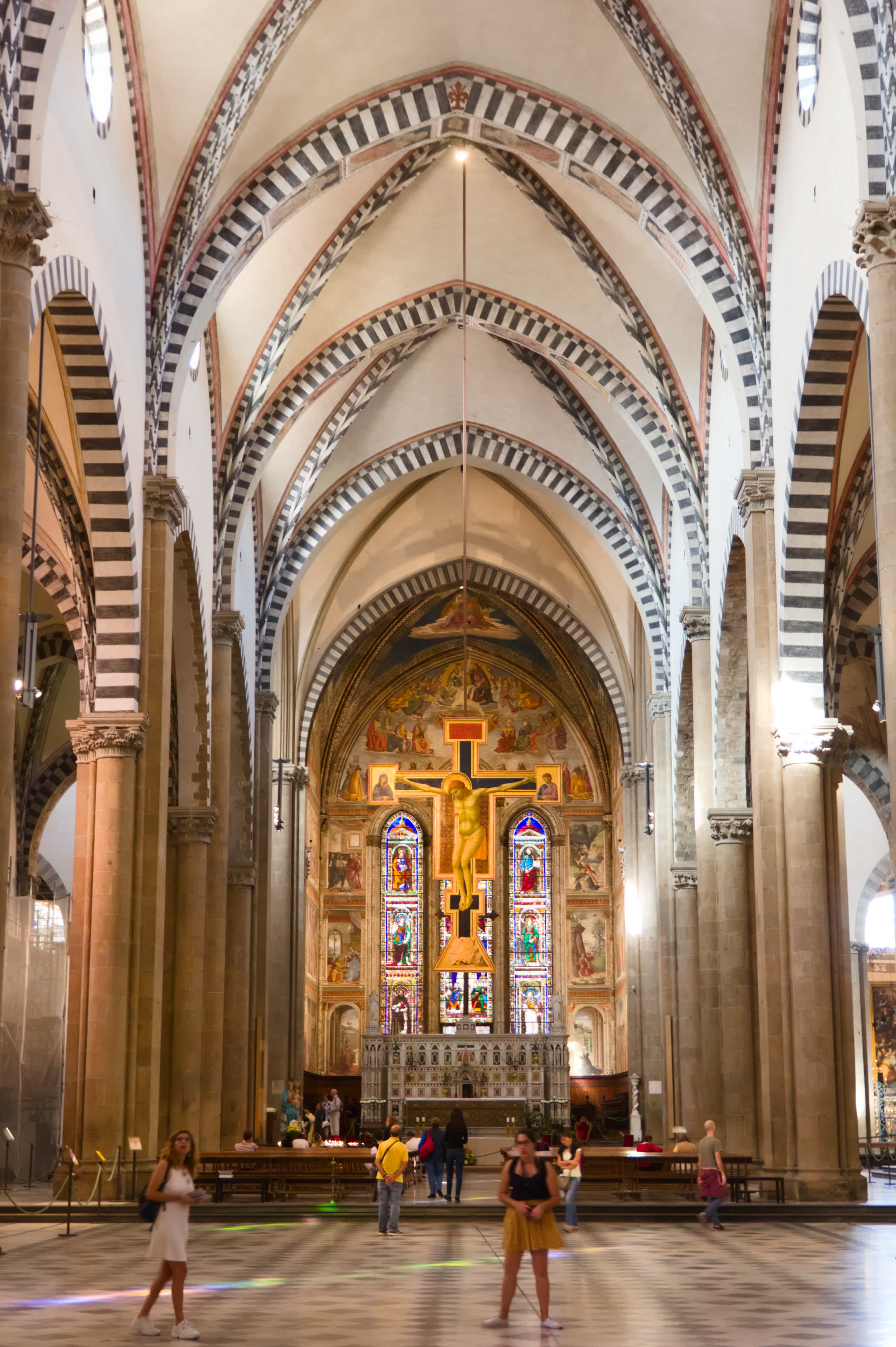 Interior of Florence Cathedral with ornate altar and stained glass windows
