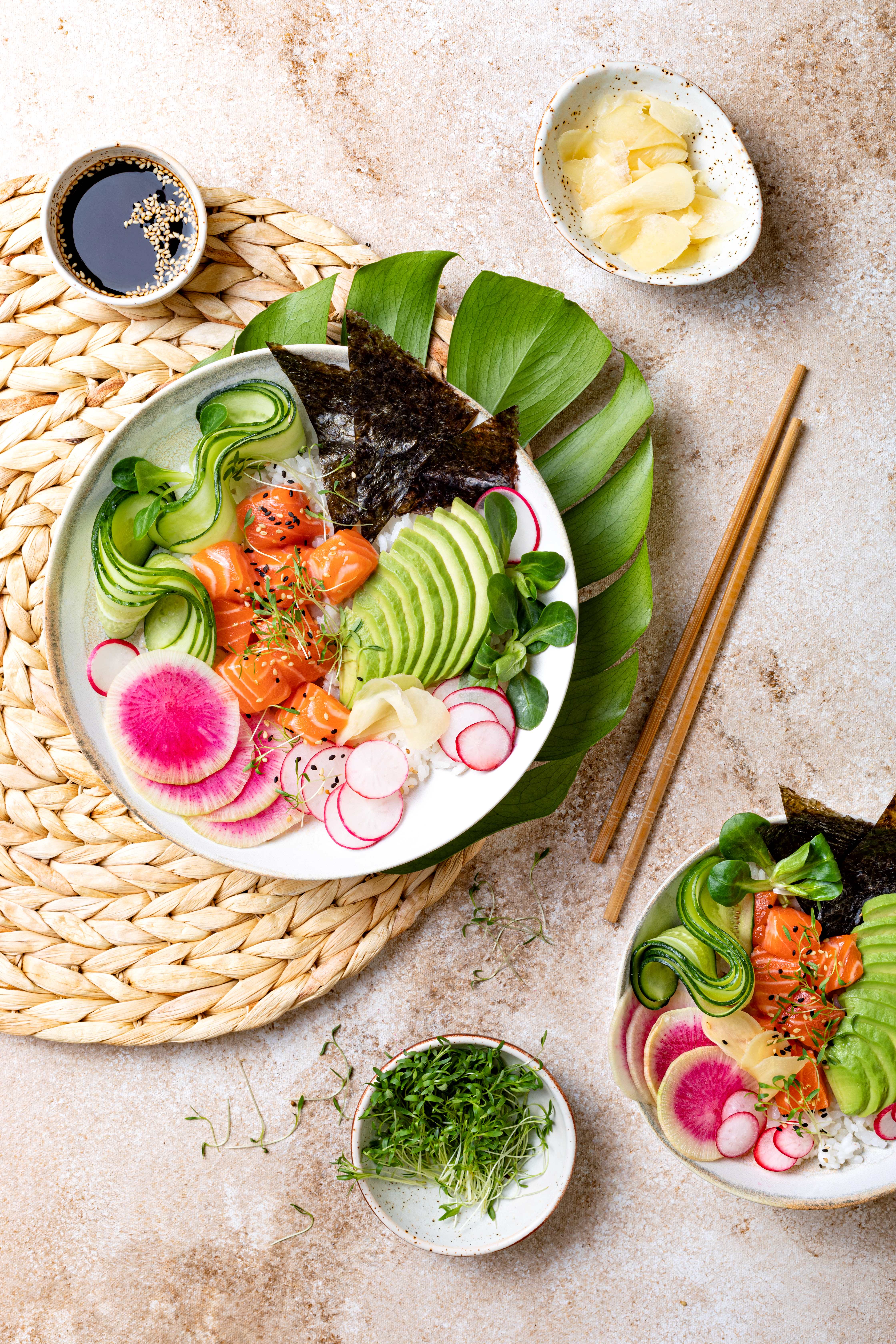 A colorful poke bowl with fresh vegetables and salmon.