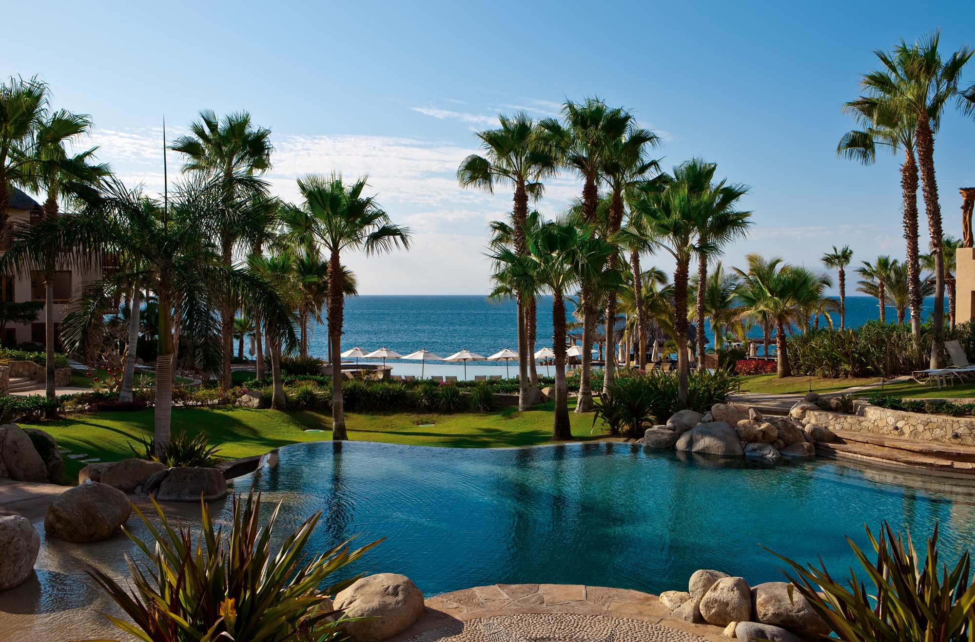 Resort pool and view of ocean in Los Cabos, Mexico