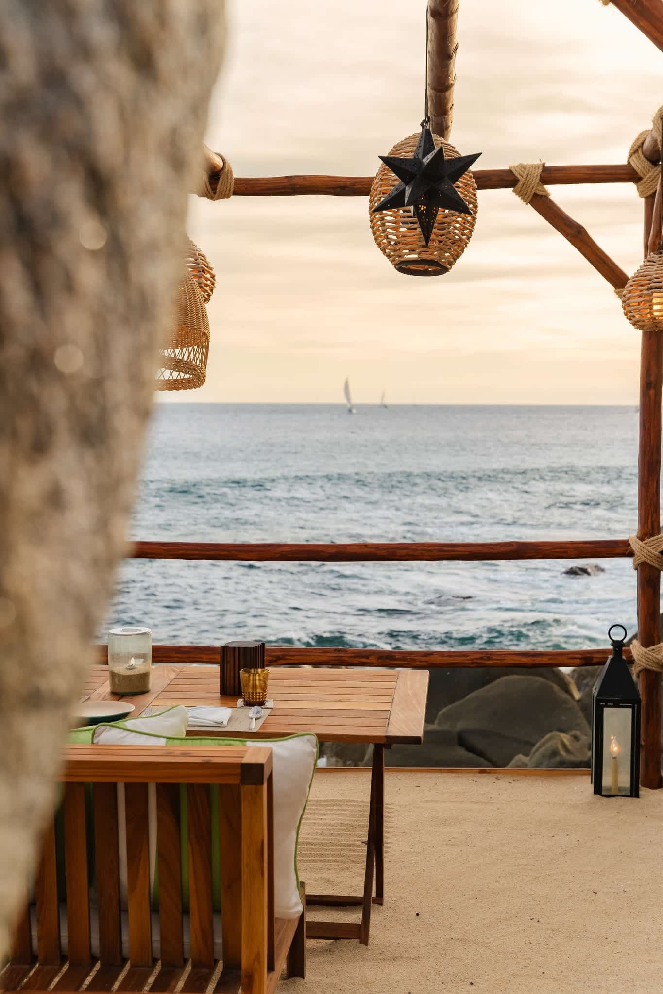 Private dining table by the beach in Los Cabos, Mexico.