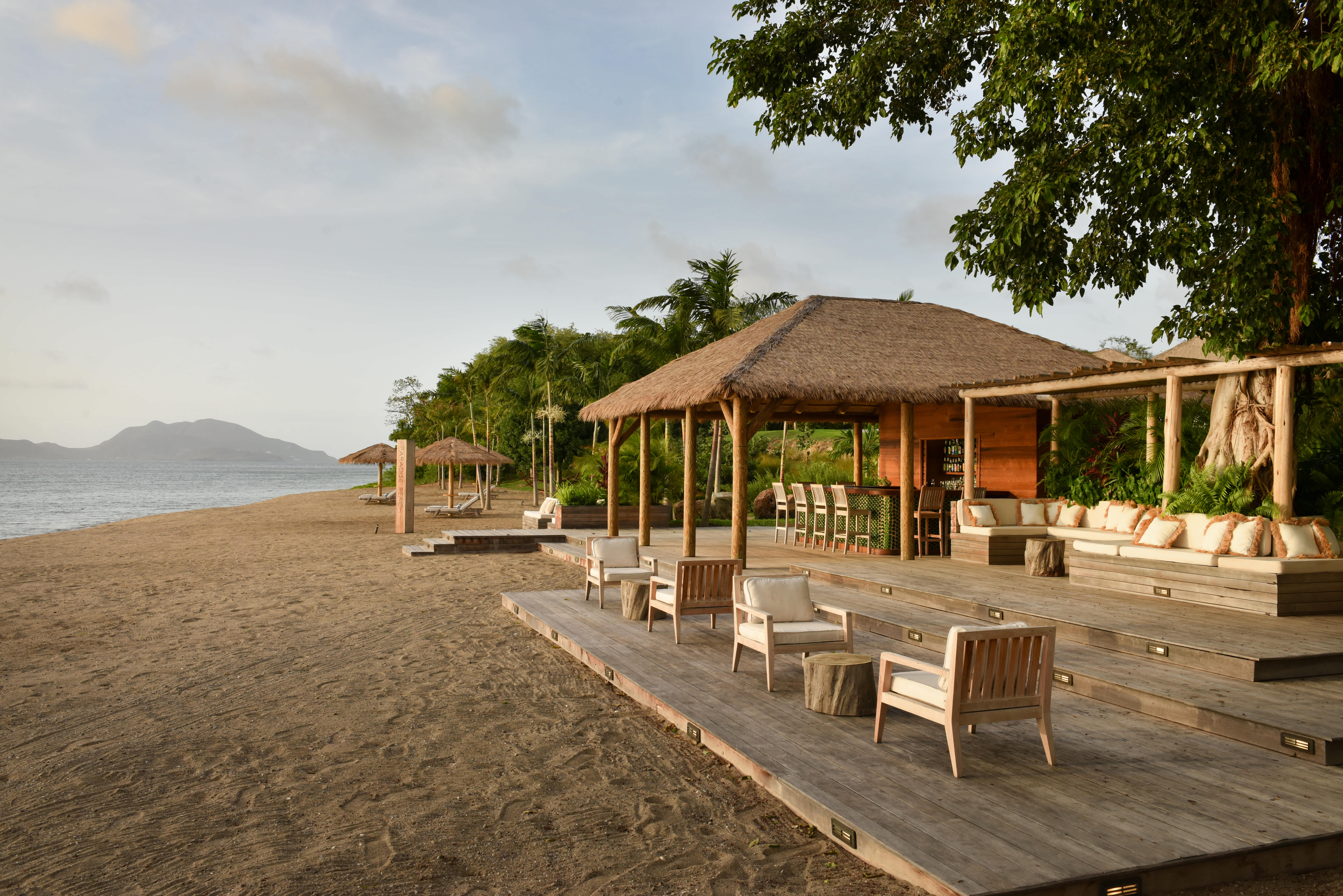 Paradise Beach Bar in Nevis with outdoor seating and a view of the shoreline