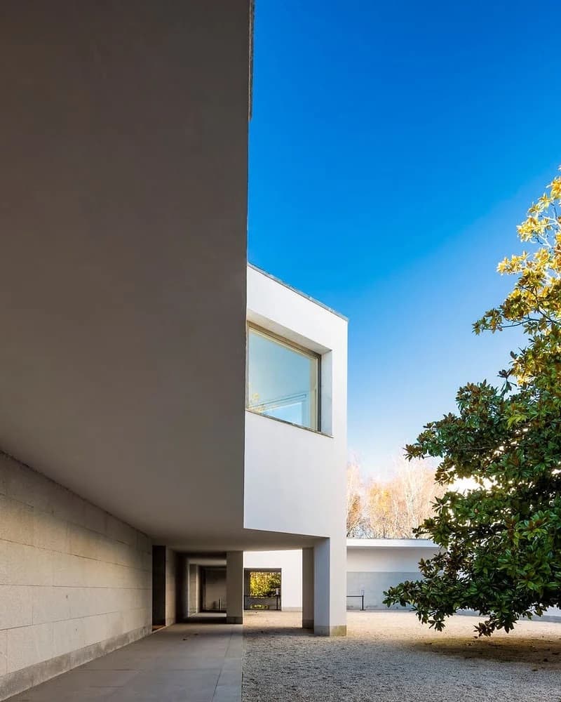 Modern building with clean lines and a tree at Serralves Museum, Porto, Portugal