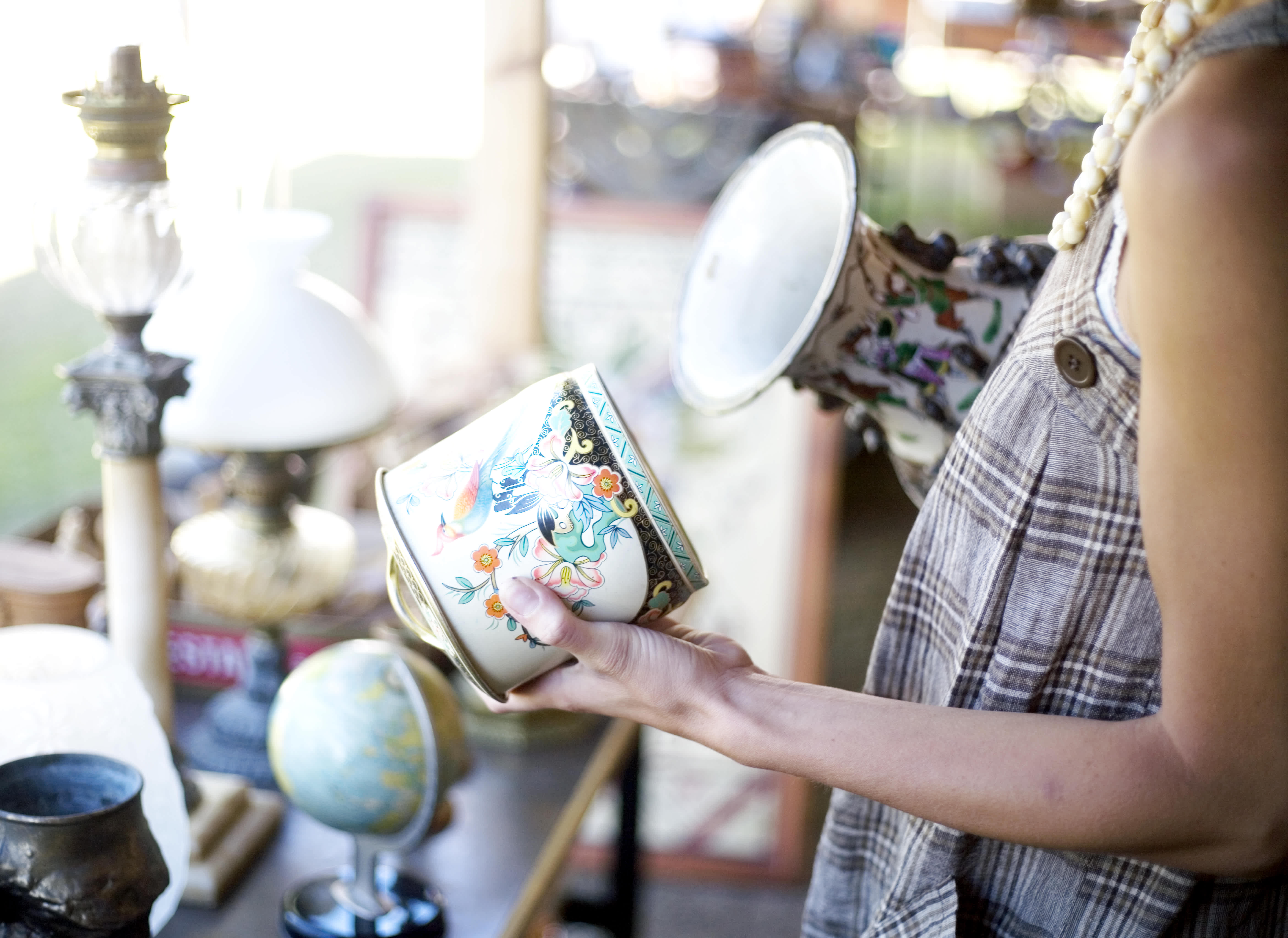 Exploring beautiful antique shops in Provence, featuring vintage items and ornate ceramics.